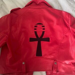 Brand new biker jacket- worn for about 20 minutes. It’s been in the closet.